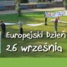 Na zdjęciu logo Europejskiego Dnia Języków na tle bawiących się na trawie dzieci.